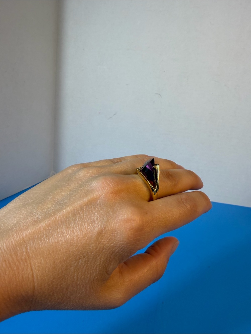Ring with a purple stone — an elegant, striking ring for women.